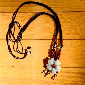 Jade necklace, handmade in Maui. Cinch cord in back.